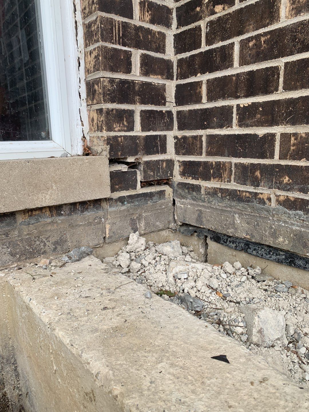 FOUNDATION SETTLING REPAIR THROUGH FOUNDATION PIERING