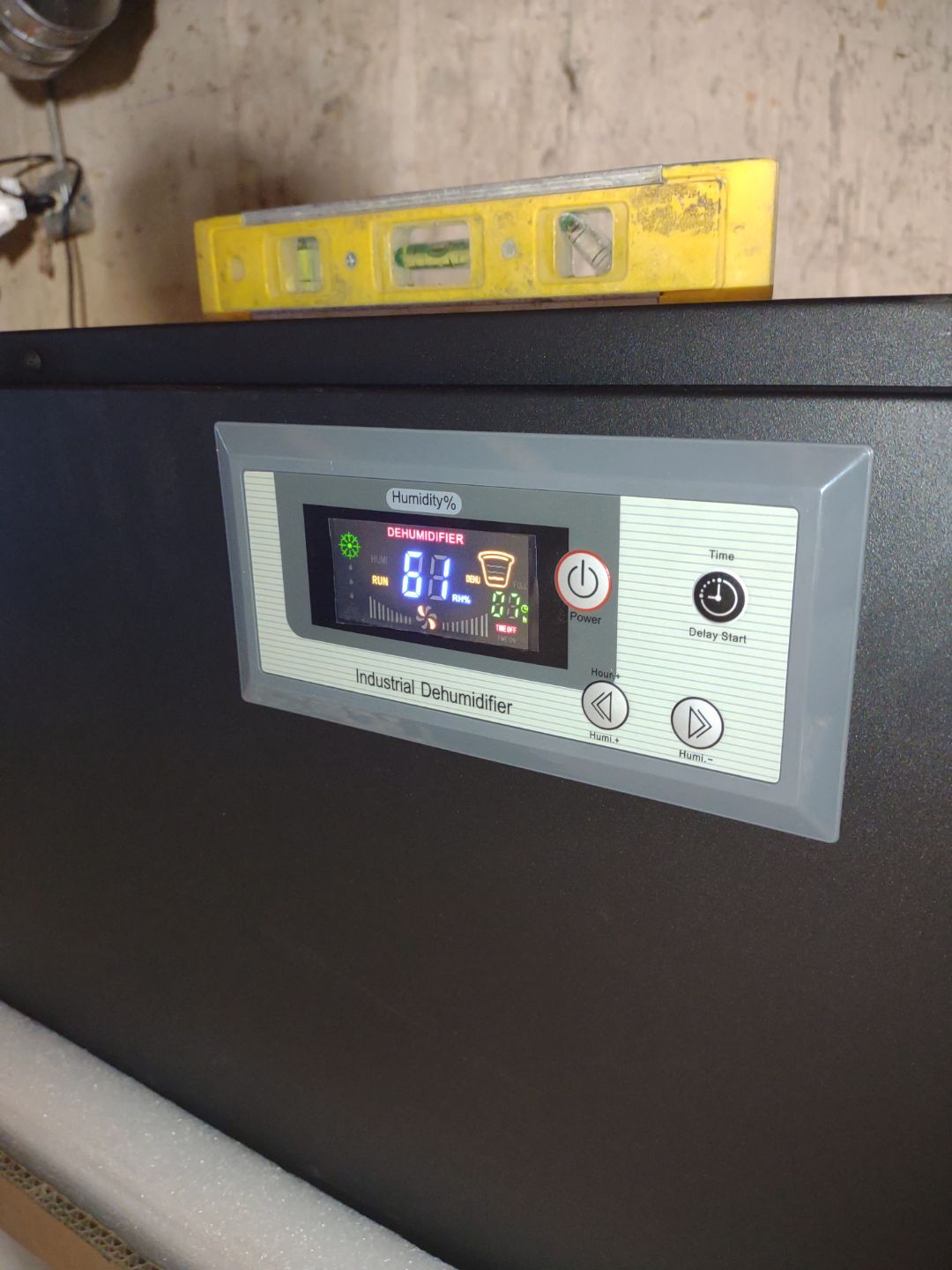A Dehumidifier is used to keep the humidity level down in the crawl space