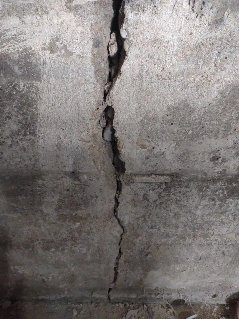 Large structural crack in basement wall.