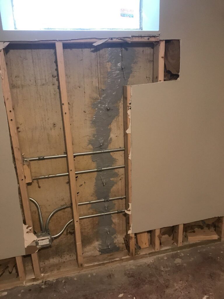crack behind drywall