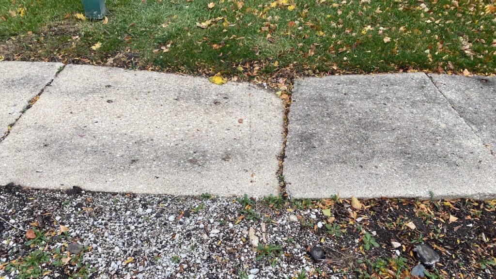 sunken concrete sidewalk