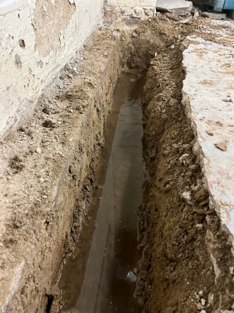 water in drain tile trench