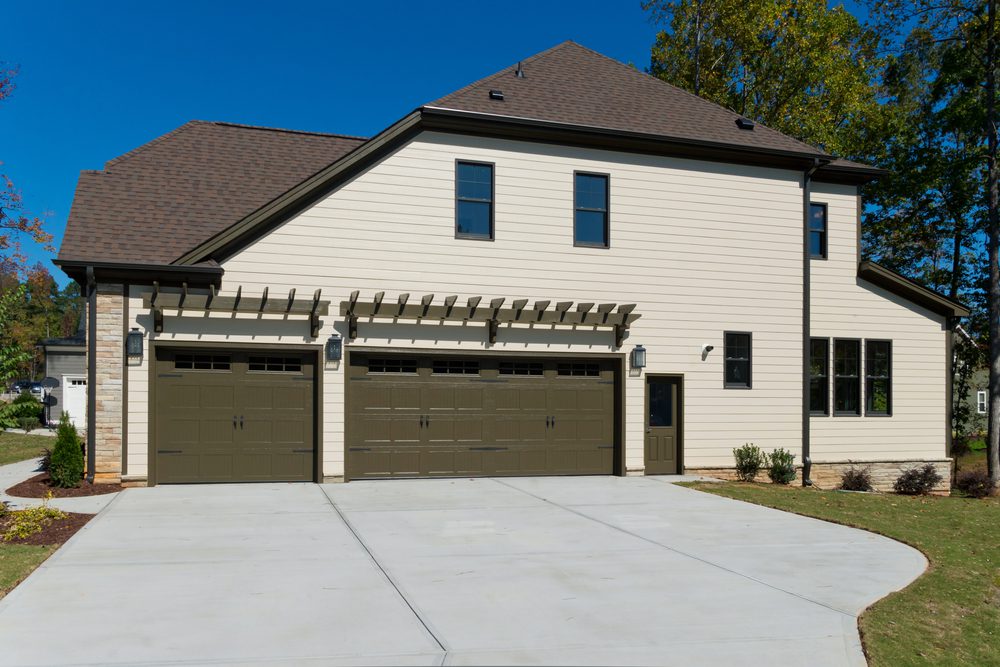 concrete driveway in front of home