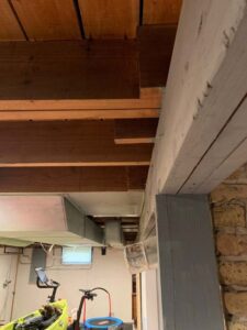 Check the support posts inside your basement or crawl space holding up your ground floor.