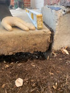 what causes uneven concrete slabs