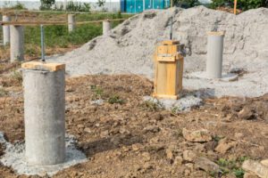 Concrete piers are a type of foundation that elevates your home off the ground.