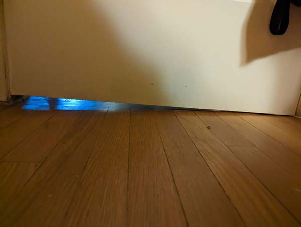 A sloped floor may indicate differential foundation settlement, weakened beams in the crawl space, or even termite damage.