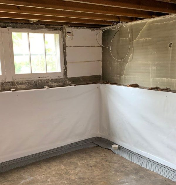 Vapor barriers act like a shield for your basement, stopping moisture from entering. They are usually made from heavy-duty plastic and installed on the walls and floors.
