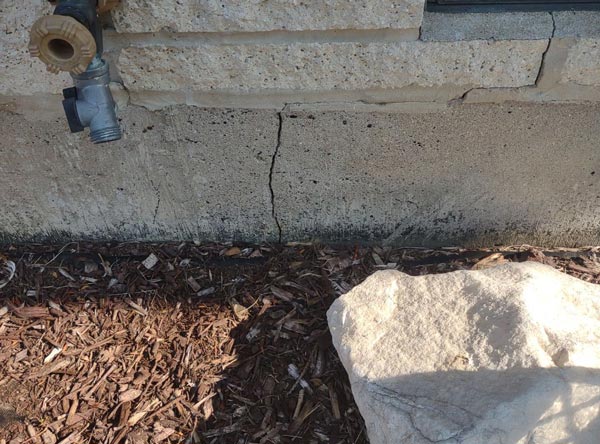 Foundation cracks can happen due to several factors. Settlement is a common culprit; as the soil beneath the foundation shifts or compresses, it causes the masonry to crack.
